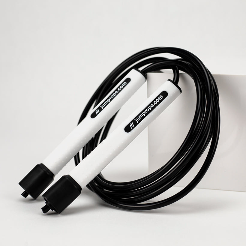 Freestyle Rope product photo on a white background with jumprope.com on the handles